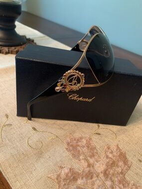 Chopard Women's Sunglasses with Multicolor Crystal Accent
All Offers Considered😃